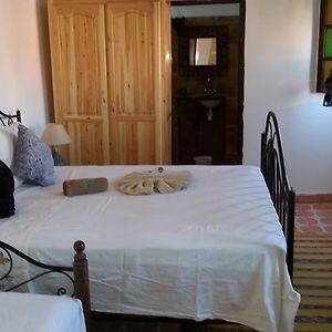 Suite met een Queen Size Bed